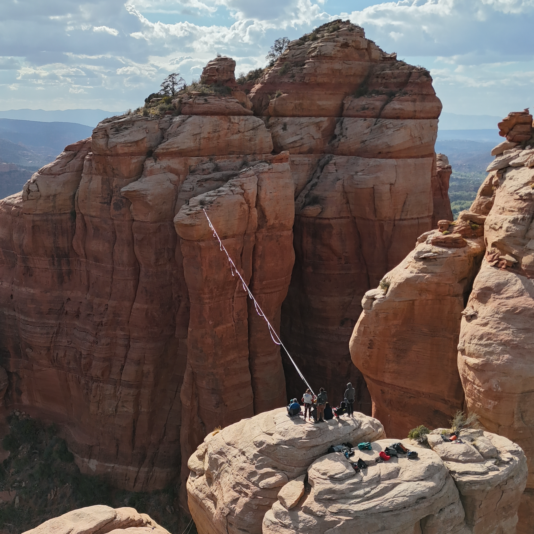 Sandstone cliffs and a canyon photographed from above